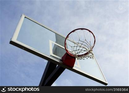 Outdoor basketball hoop on a cloudy day