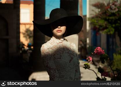 Outdoor fashion art photo elegant lady in an old European town
