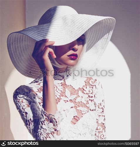 Outdoor fashion photo of young beautiful lady in hat and sunglasses. Summer Beach travel. Summer vibes