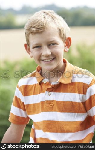 Outdoor Head And Shoulder Portrait Of Boy