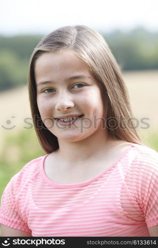 Outdoor Head And Shoulders Portrait Of Girl
