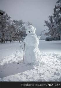 Outdoor photo of big snowman at winter park