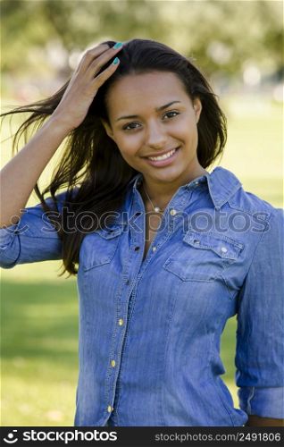 Outdoor portrait of a beautiful African American smiling