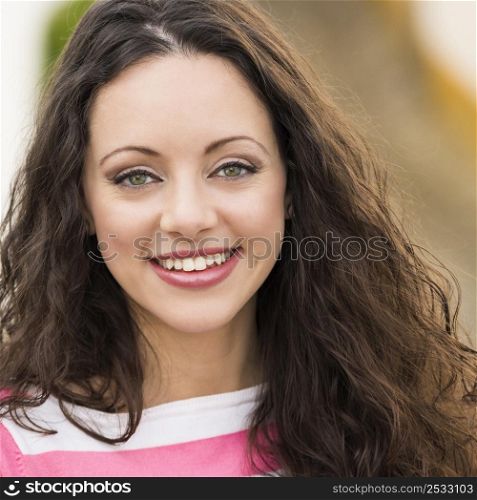 Outdoor portrait of a beautiful and fresh young woman
