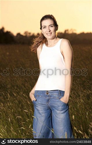 Outdoor portrait of a beautiful woman on a summer day
