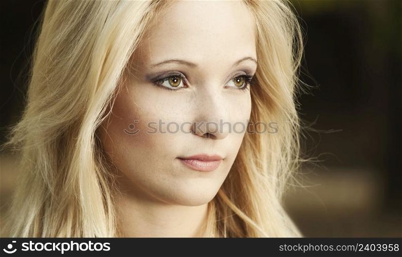 Outdoor portrait of a beautiful young girl