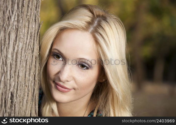 Outdoor portrait of a beautiful young girl. Blonde Girl