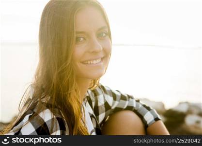 Outdoor portrait of a beautiful young woman