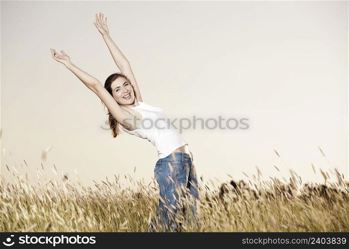 Outdoor portrait of a woman on a meadow releaxing