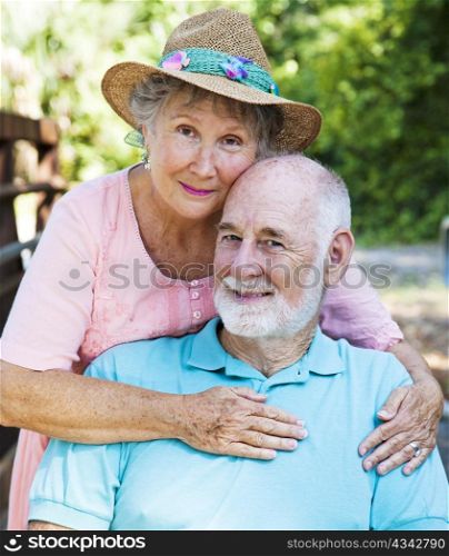 Outdoor portrait of beautiful senior couple in love.