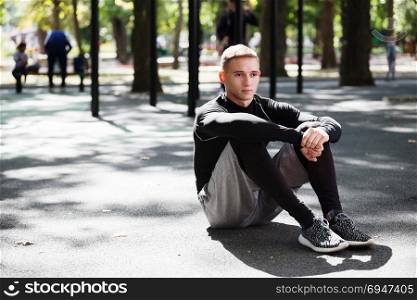 Outdoor portrait of healthy handsome active man with fit muscular body, sports and fitness concept. Outdoor portrait of healthy handsome active man with fit muscular body, sports and fitness concept.