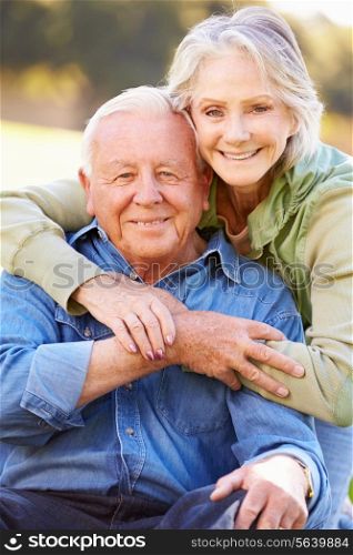 Outdoor Portrait Of Loving Senior Couple