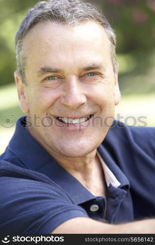 Outdoor Portrait Of Smiling Senior Man