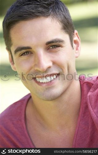 Outdoor Portrait Of Smiling Young Man
