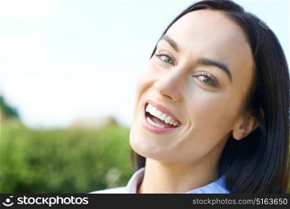 Outdoor Portrait Of Woman With Perfect Teeth And Beautiful Smile