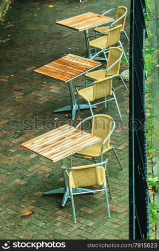 Outdoor restaurant coffee open air cafe chairs with table. Summer vacation on resort