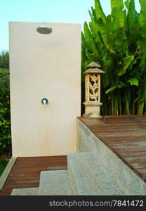 outdoor shower near swimming pool in tropical resort