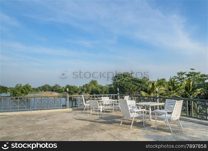 Outdoor white chair and table on the terrace