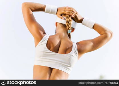 Outdoor workout. Young attractive sport girl in white sport wear in park