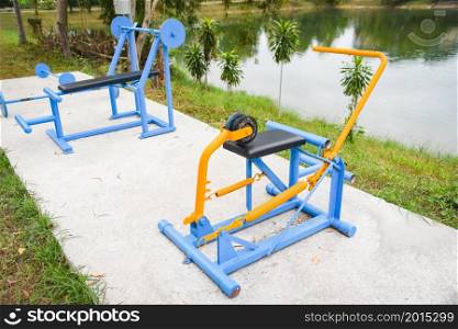 Outdoors gym playground equipment in the public garden, outdoor fitness equipment in the park