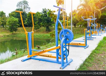 Outdoors gym playground equipment in the public garden, outdoor fitness equipment in the park