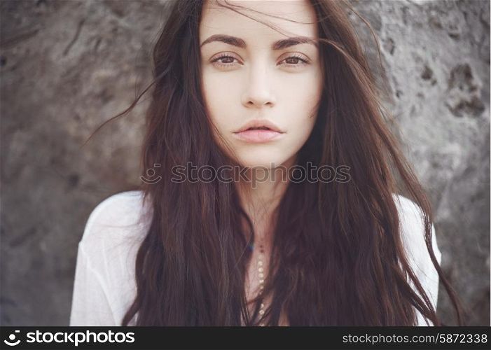 Outdoors portrait of beautiful romantic lady with magnificent hair
