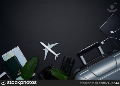 Outfit ,accessories and equipment of traveler on black background with copy space . Summer vacation concept