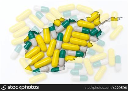 Outline afghanistan map with transparent background of capsules symbolizing pharmacy and medicine