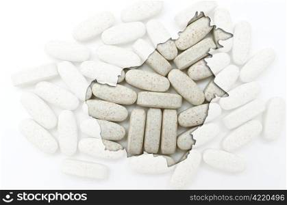 Outline borneo map with transparent background of capsules symbolizing pharmacy and medicine