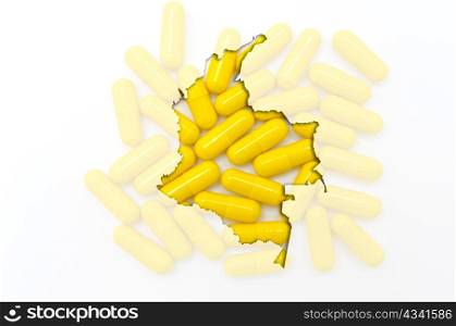 Outline colombia map with transparent background of capsules symbolizing pharmacy and medicine