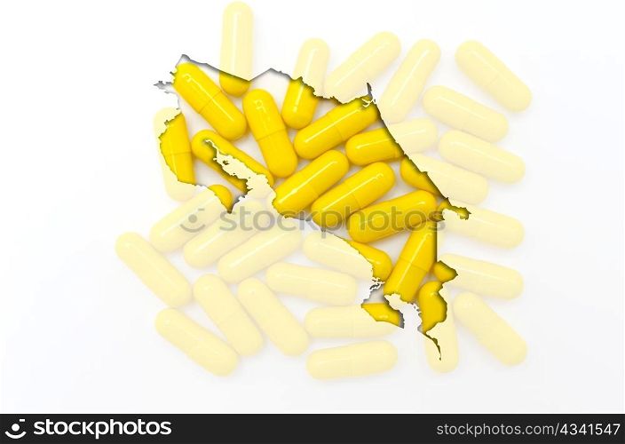 Outline costa rica map with transparent background of capsules symbolizing pharmacy and medicine