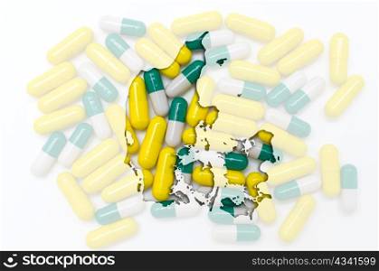 Outline denmark map with transparent background of capsules symbolizing pharmacy and medicine