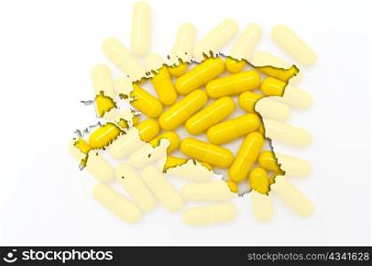Outline estonia map with transparent background of capsules symbolizing pharmacy and medicine