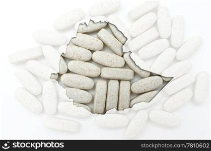 Outline ethiopia map with transparent background of capsules symbolizing pharmacy and medicine
