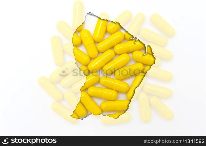 Outline french guiana map with transparent background of capsules symbolizing pharmacy and medicine