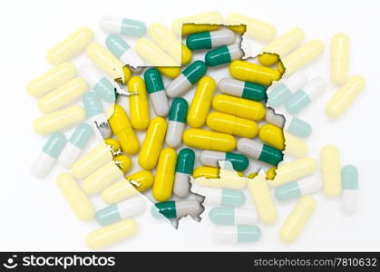 Outline gabon map with transparent background of capsules symbolizing pharmacy and medicine