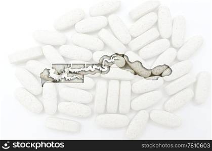 Outline gambia map with transparent background of capsules symbolizing pharmacy and medicine