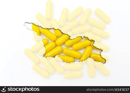 Outline georgia map with transparent background of capsules symbolizing pharmacy and medicine