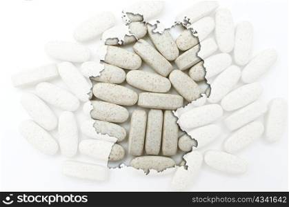 Outline germany map with transparent background of capsules symbolizing pharmacy and medicine