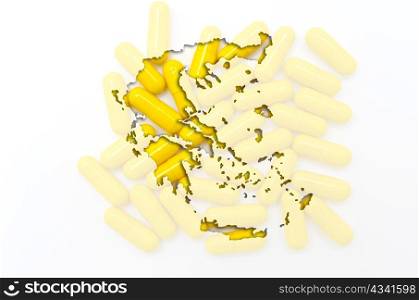 Outline greece map with transparent background of capsules symbolizing pharmacy and medicine