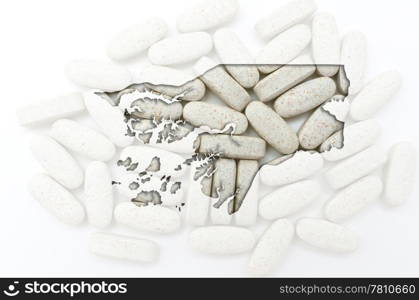 Outline guinea bissau map with transparent background of capsules symbolizing pharmacy and medicine