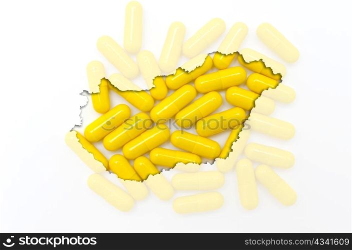 Outline hungary map with transparent background of capsules symbolizing pharmacy and medicine