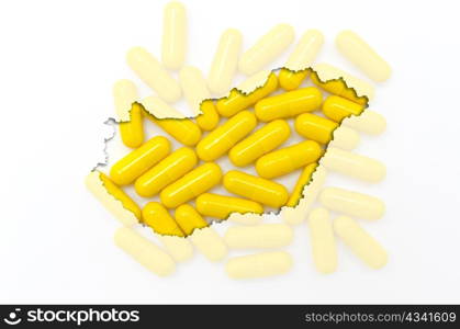 Outline hungary map with transparent background of capsules symbolizing pharmacy and medicine