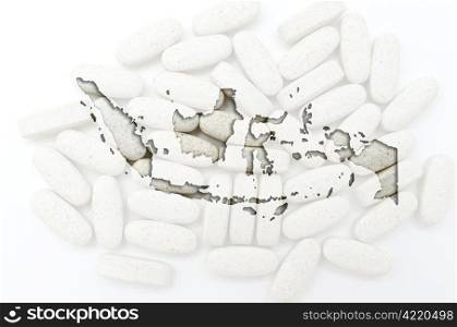 Outline indonesia map with transparent background of capsules symbolizing pharmacy and medicine