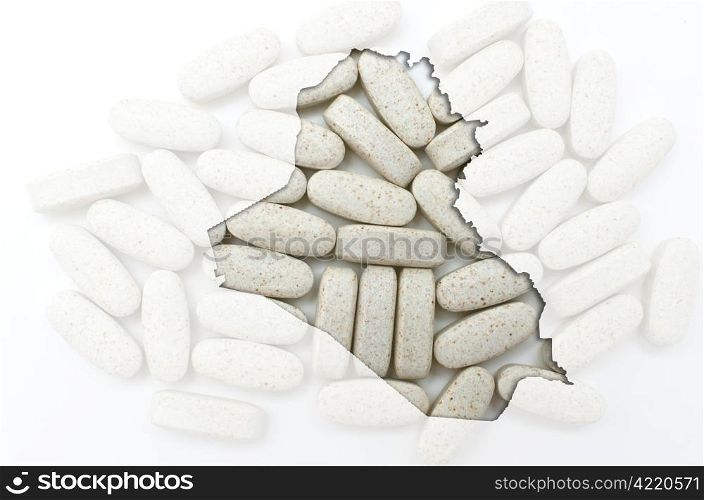 Outline iraq map with transparent background of capsules symbolizing pharmacy and medicine