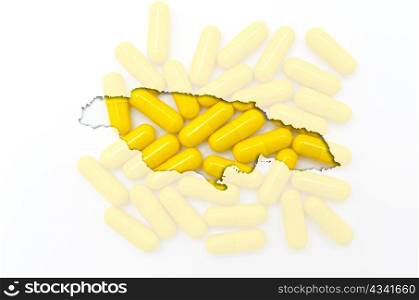 Outline jamaica map with transparent background of capsules symbolizing pharmacy and medicine