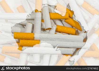 Outline map of Australia with cigarettes in background