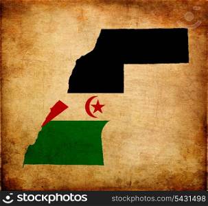 Outline map of Western Sahara with flag and grunge paper effect