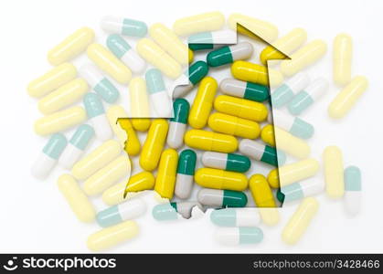 Outline mauritania map with transparent background of capsules symbolizing pharmacy and medicine