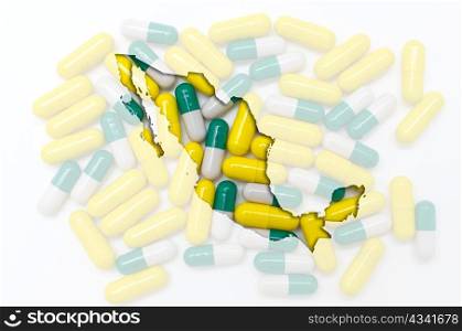 Outline mexico map with transparent background of capsules symbolizing pharmacy and medicine